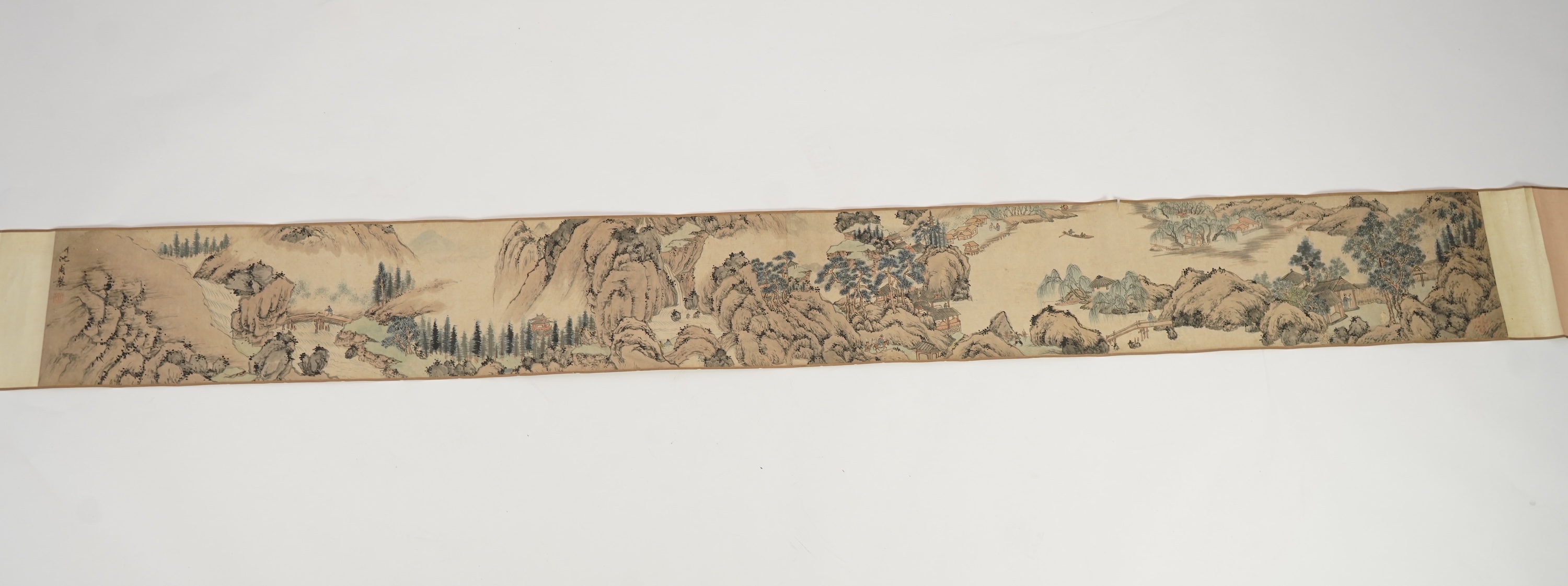 Chinese School , (Qing dynasty), Figures in a mountainous river landscape, Ink and colour on paper handscroll, 268.5cm x 29cm excluding borders